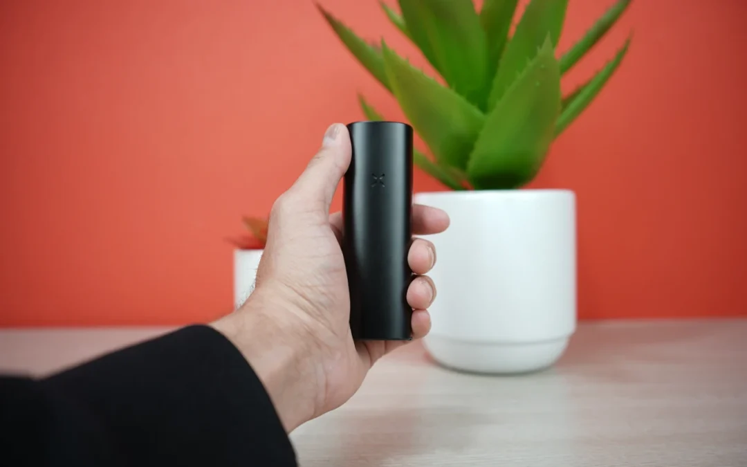 Handheld size comparison of the compact Pax 4 portable vape