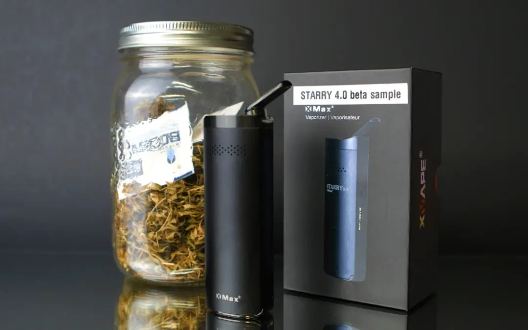 This photo shows the XMAX starry in front of a jar of weed, and the box which says starry 4 sample on it