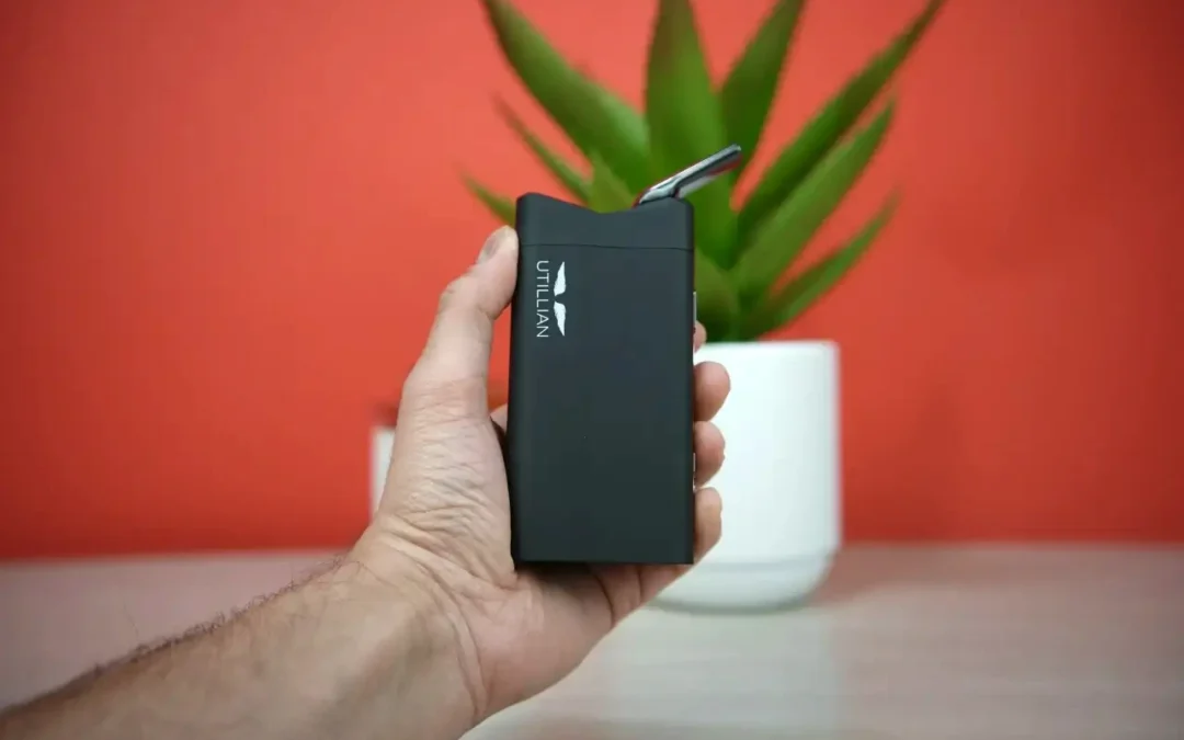 Testing the portability and size of the Utillian 850 vaporizer by holding it in hand