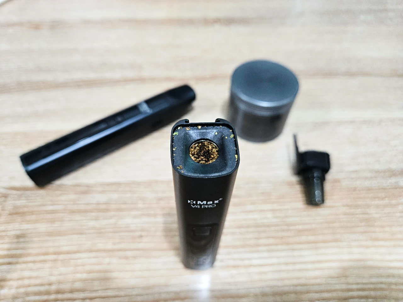 XMAX V4 Pro black portable vaporizer with loaded heating chamber top view